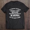 A Strong Woman Doesn't Seek Revenge She Moves On And Let Karma Do The Dirty Work Tee